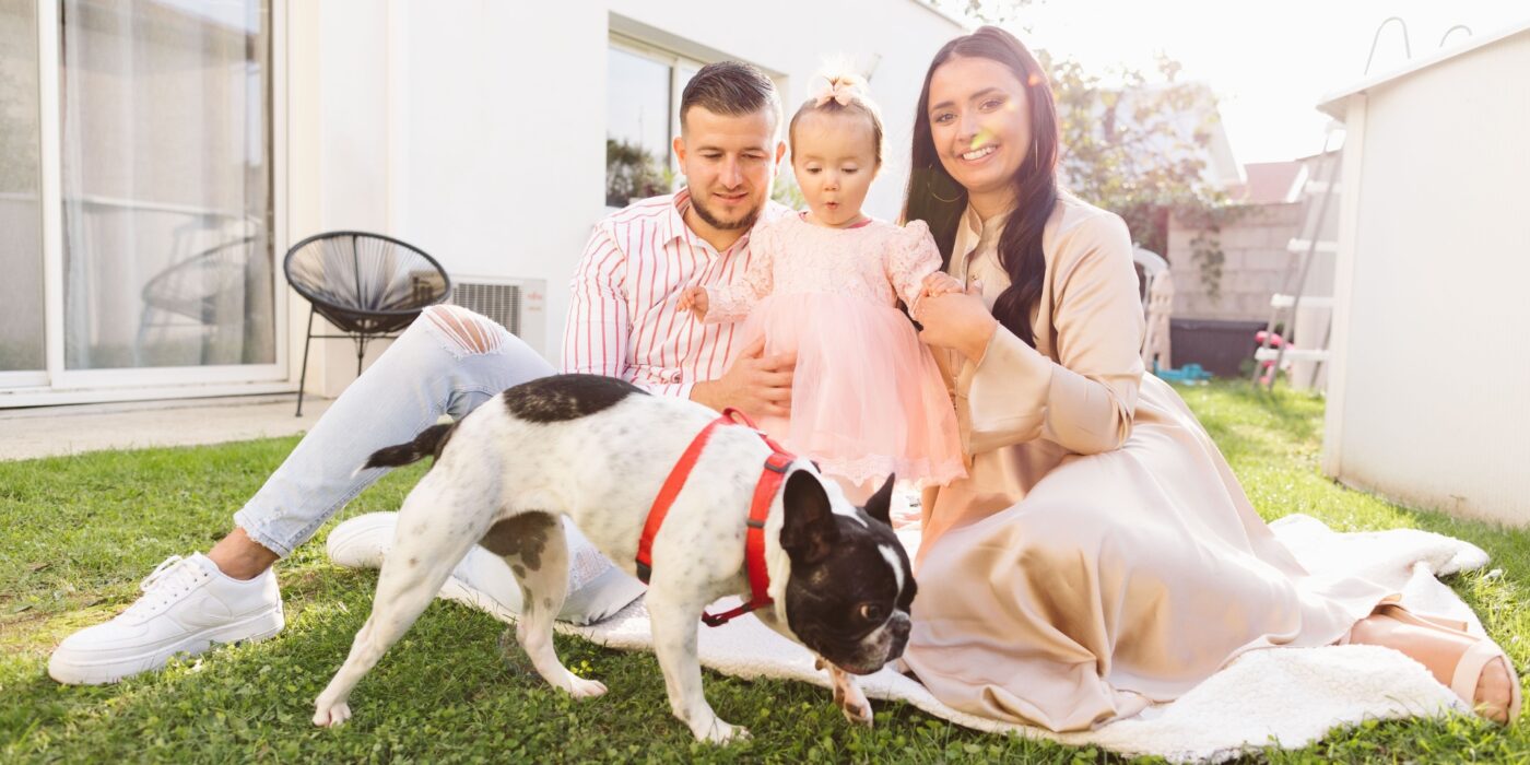 family with kids and pets in villa